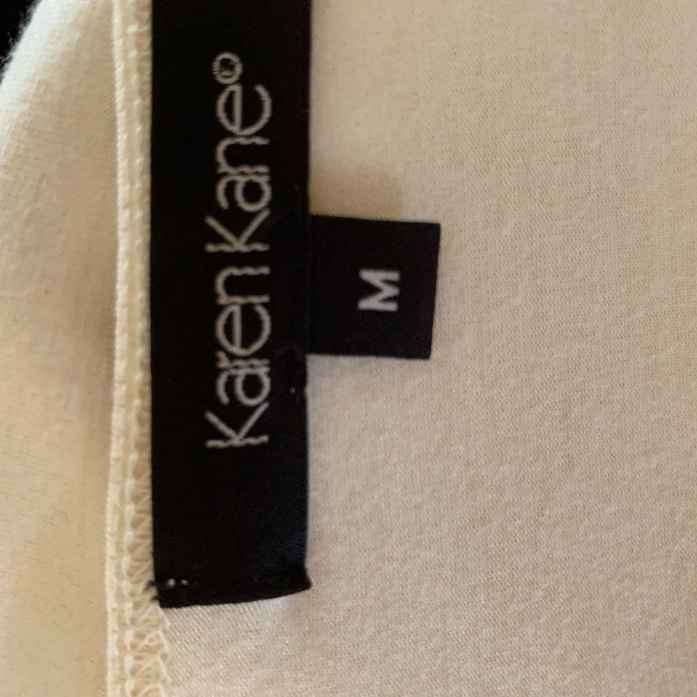 Ivory Plunging Neckline Top